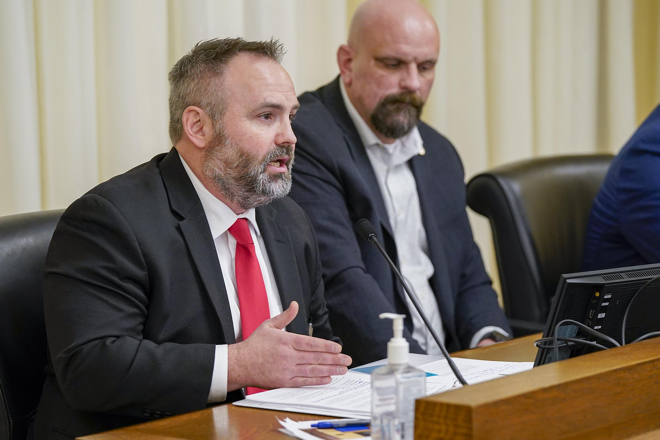 Shane Myre, president of the Minnesota Police and Peace Officers Association, testifies before the House Public Safety Finance and Policy Committee in support of HF340 that would establish new penalties for engaging in certain actions related to fleeing a peace officer in a motor vehicle. (Photo by Michele Jokinen)